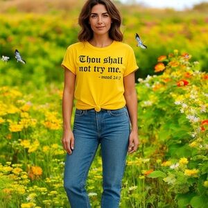 Cute yellow tee with fun sayings in black on front!